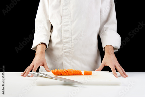 Photo: Chef cutting carrots Chef cutting carrots