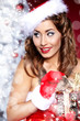 Portrait of beautiful sexy girl wearing santa claus clothes Portrait of beautiful sexy girl wearing santa claus clothes