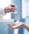 Man is handing a house key to a woman