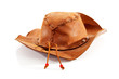 brown western hat over white background