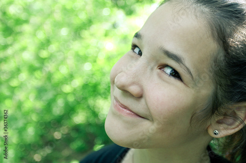 Photo: endearing cute girl in the beautiful morning park outdoor endearing cute girl in the beautiful morning park outdoor
