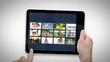 Tablet computer showing families relaxing
