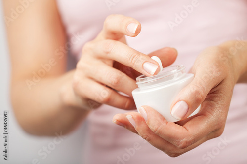 Photo: beautiful woman hands with cream beautiful woman hands with cream