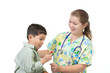 Nurse gives boy candy.