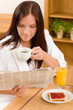 Breakfast at home happy woman read newspapers Breakfast at home happy woman read newspapers