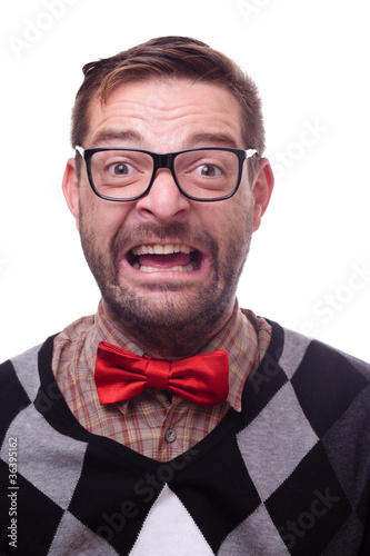 Photo: Happy geek laughing hysterically. Nerd series. Happy geek laughing hysterically. Nerd series.