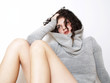 Photo: Beautiful young woman sitting Beautiful young woman sitting