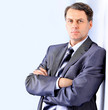 Portrait of a handsome young man in a business suit