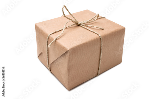 Photo: brown paper parcel tied with string brown paper parcel tied with string