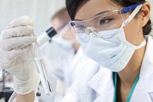Photo: Chinese Female Woman Scientist With Test Tube In Laboratory Chinese Female Woman Scientist With Test Tube In Laboratory