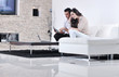 joyful couple relax and work on laptop computer at modern home
