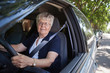 Old woman driving car