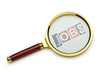Unemployment concept with magnifying glass