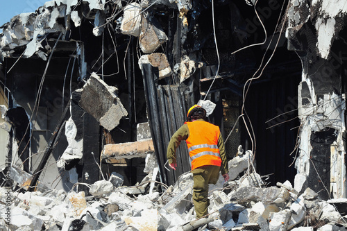 Photo: Search and Rescue Through Building Rubble after a Disaster Search and Rescue Through Building Rubble after a Disaster