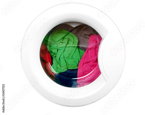 Photo: Washing machine with clean colorful clothes Washing machine with clean colorful clothes