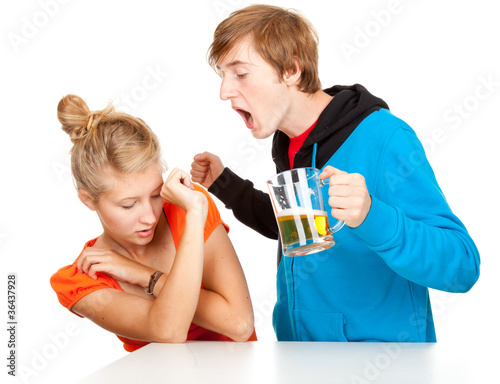 Photo: violence - couple is arguing, drunk man striking girlfriend violence - couple is arguing, drunk man striking girlfriend