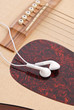 Head Phones on an Acoustic Guitar Head Phones on an Acoustic Guitar