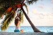 yoga woman under palm