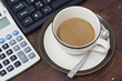 A cup of coffee on desk top