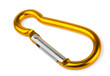 Single golden aluminium carabiner isolated on white