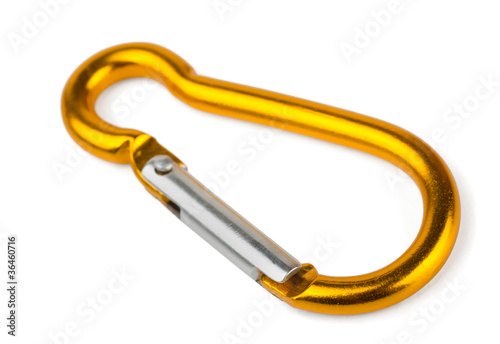 Photo: Single golden aluminium carabiner isolated on white Single golden aluminium carabiner isolated on white