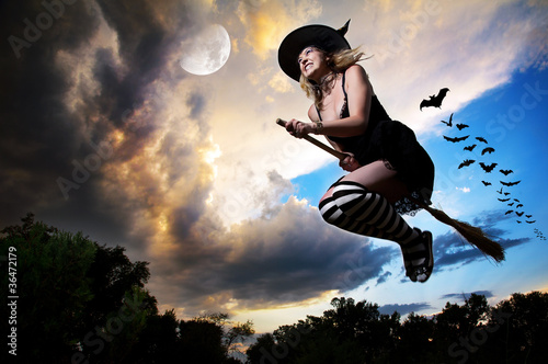 Photo: Flying witch on broomstick Flying witch on broomstick