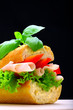 Delicious roll full of ham, paprika and lettuce