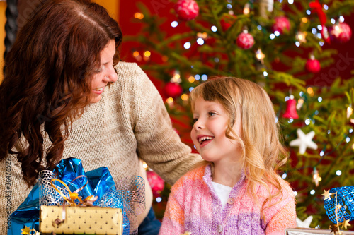 Photo: Christmas - family with gifts on Xmas Eve Christmas - family with gifts on Xmas Eve