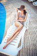 Charming brunette relaxing