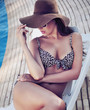 Charming brunette relaxing