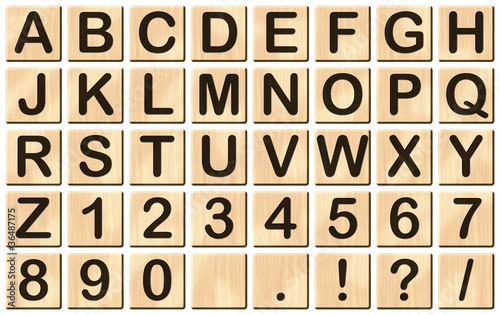 Photo: Buchstaben-Spielsteine (Illustration mit Lichteffekten) Buchstaben-Spielsteine (Illustration mit Lichteffekten)