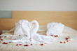 Towel swans left by a hotel room service