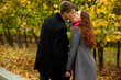 young woman and man kissing