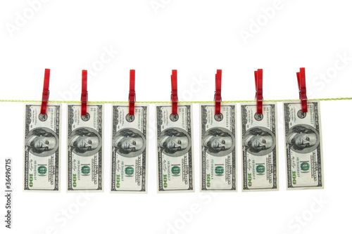 Photo: Geldwäsche mit Dollar auf Wäscheleine Geldwäsche mit Dollar auf Wäscheleine