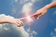 Photo: Fingers reaching to touch in a sky background Fingers reaching to touch in a sky background