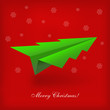 Concept of the Christmas tree and origami airplane