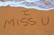 I miss you writing on the sand with water coming to erase it I miss you writing on the sand with water coming to erase it