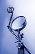 magnifying glass & internet symbol
