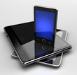 Glowing mobile phone standing on digital pads