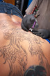 Tatto Artist Draws on Skin
