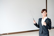 attractive businesswoman with whiteboard