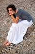 woman sitting on the stone