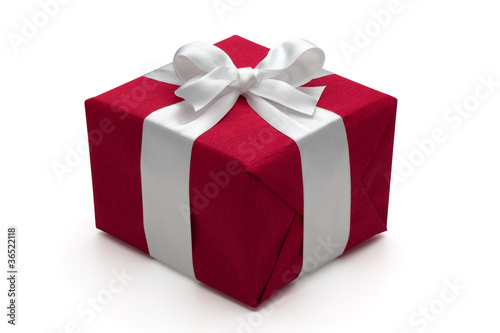 Photo: Red gift box with white ribbon. Red gift box with white ribbon.