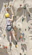 Rock Climbing Woman in Yellow Helmet