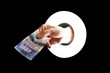 Photo: Hand withBritish twenty pound note Hand withBritish twenty pound note