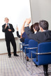 Portrait of a senior manager giving presentation