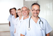 Portrait of a mature male doctor standing