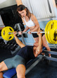 man and a woman in the gym
