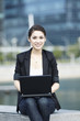 Photo: Business woman using a Laptop Business woman using a Laptop