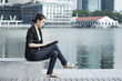 Photo: Business woman using an iPad Business woman using an iPad